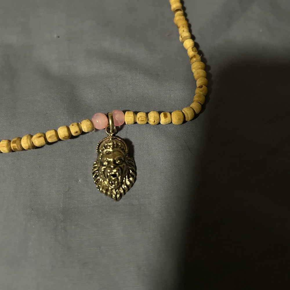 Gorgeous lion face necklace with wooden and Pink Beads